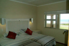 Two single beds side by side in bedroom